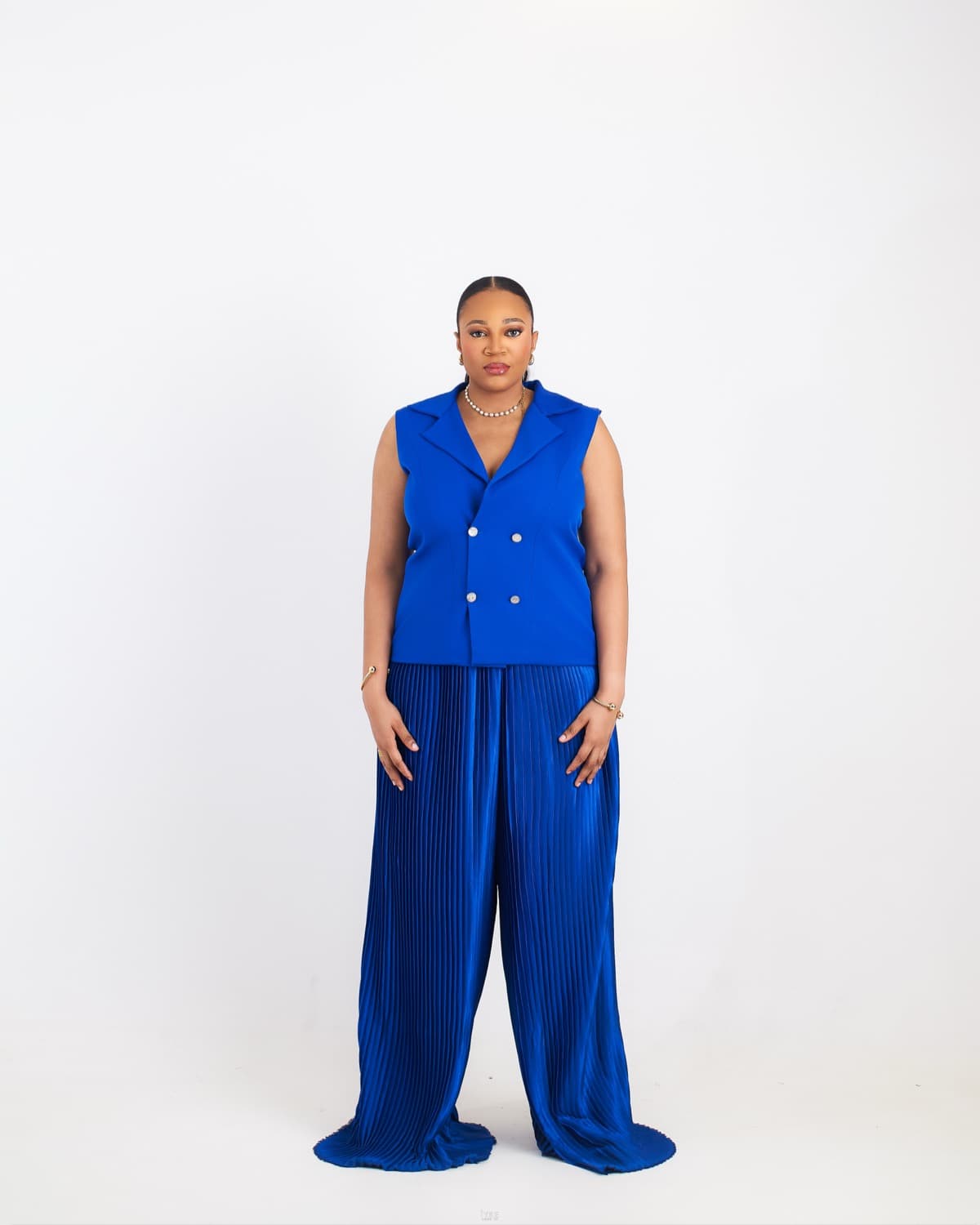 The Utility Jumpsuit — Olive — back view